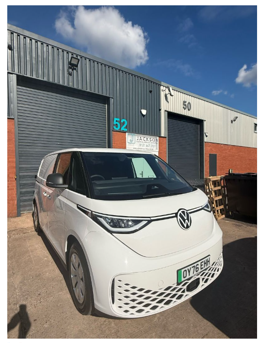 White Volkswagen electric service van outside Jackson Electrical's Unit 52 premises in Lichfield