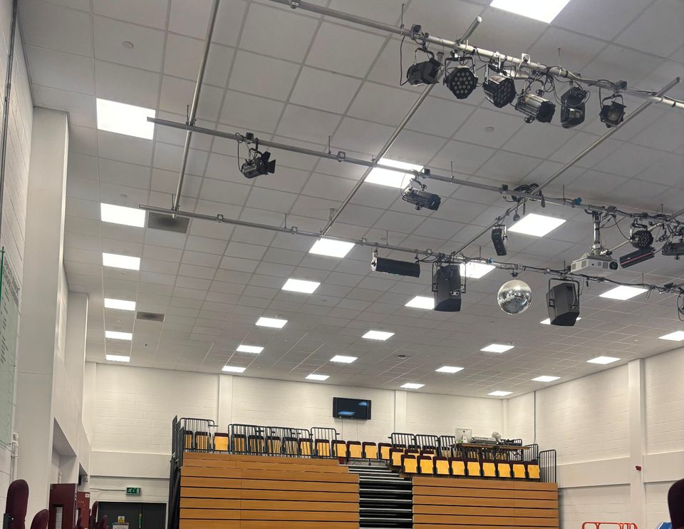 High-level LED ceiling panels in the auditorium at Arthur Terry School