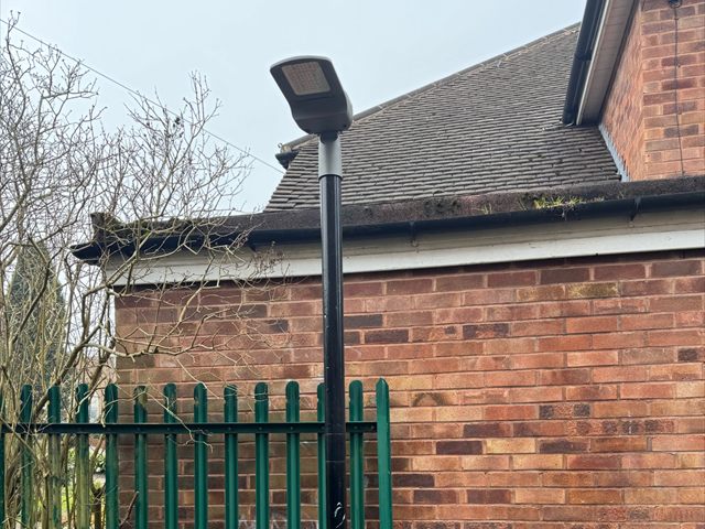 Replacement post-top light after an external lighting upgrade at a Birmingham school
