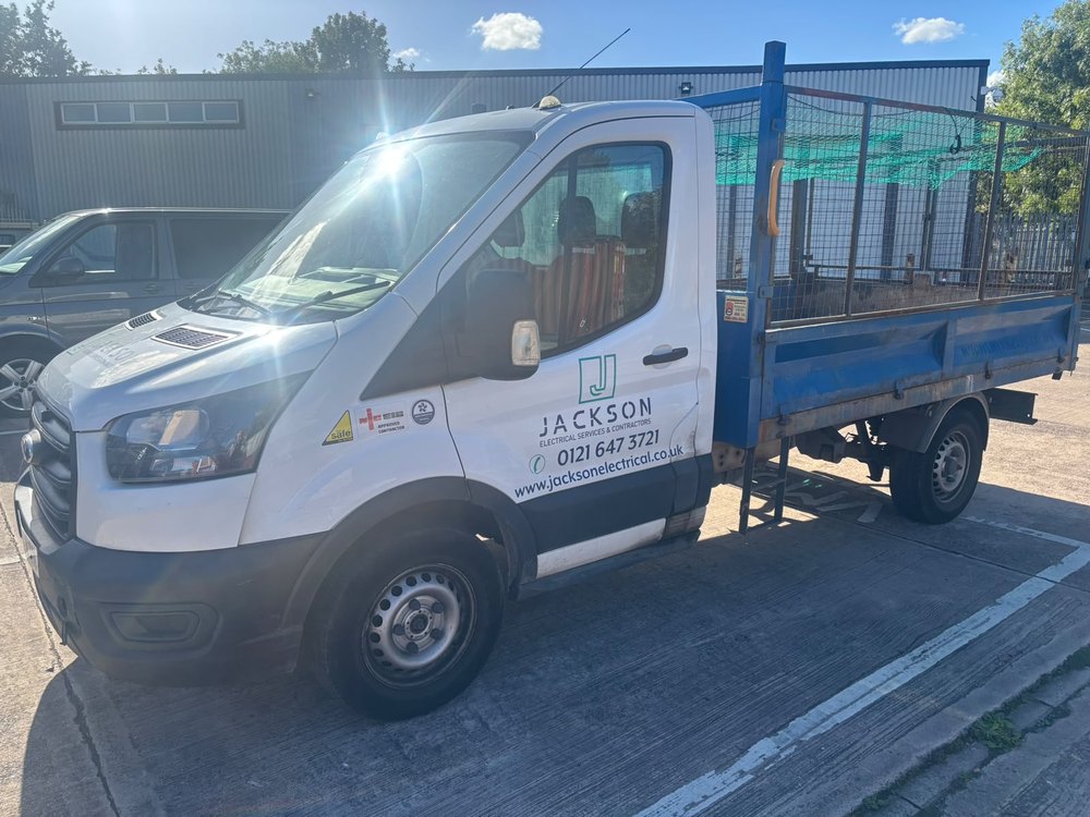 Jackson-branded caged waste collection vehicle