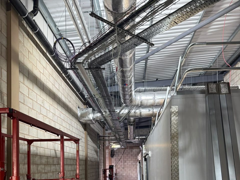Electrical containment and cable routes in a service area at Aldi Lower Gornal