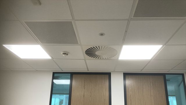 Illuminated ceiling panels in an office at Wesleyan